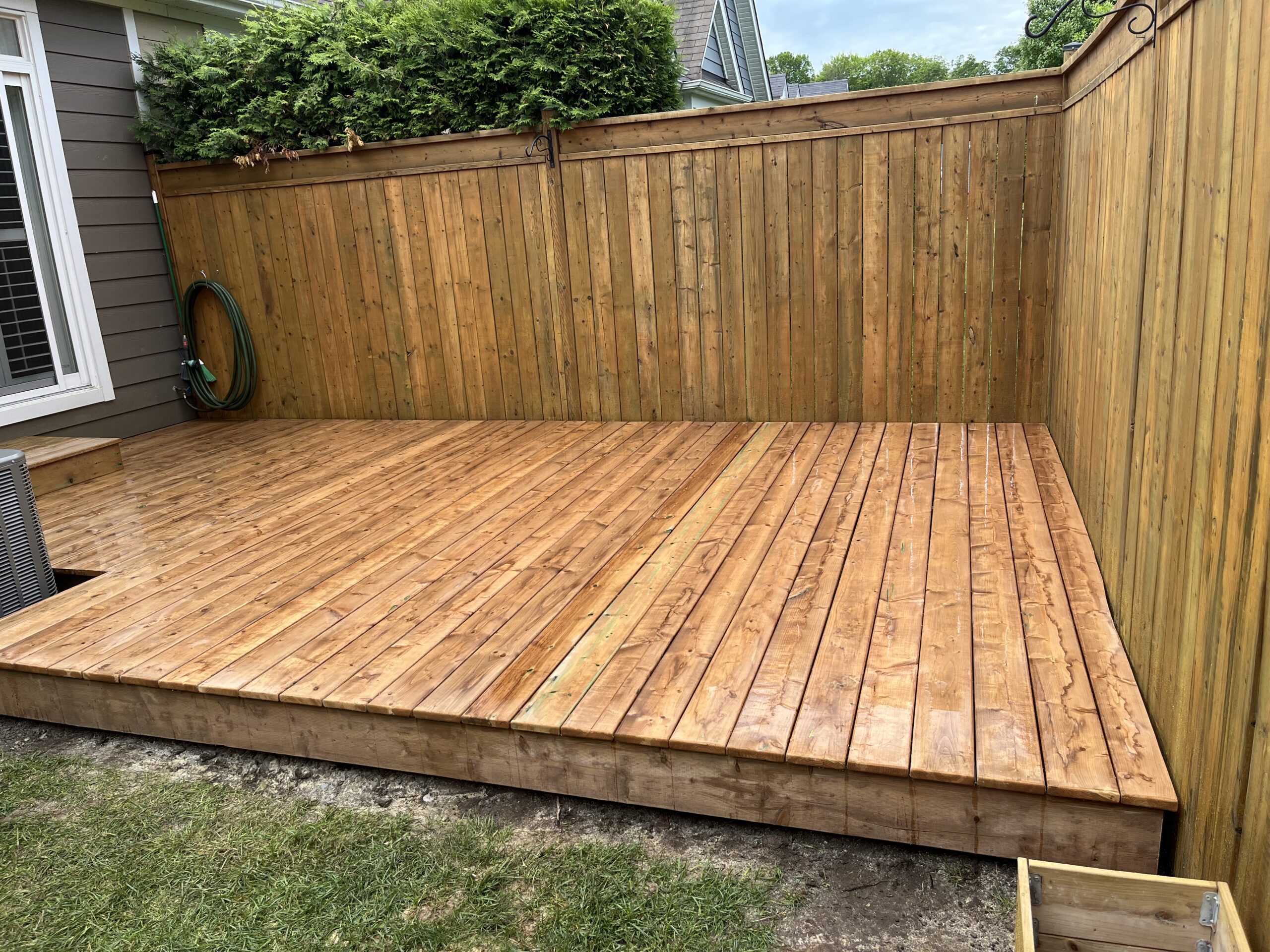Freshly stained deck and fence