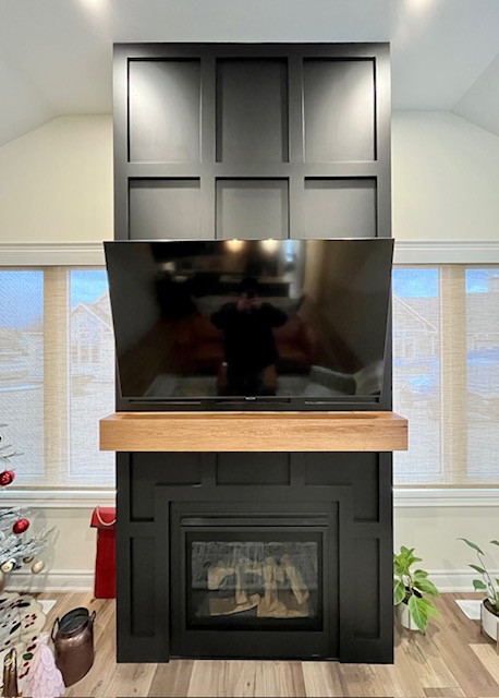 Custom fireplace millwork built by Belvedere Home Services